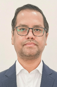Dr. M. Tiken Singh